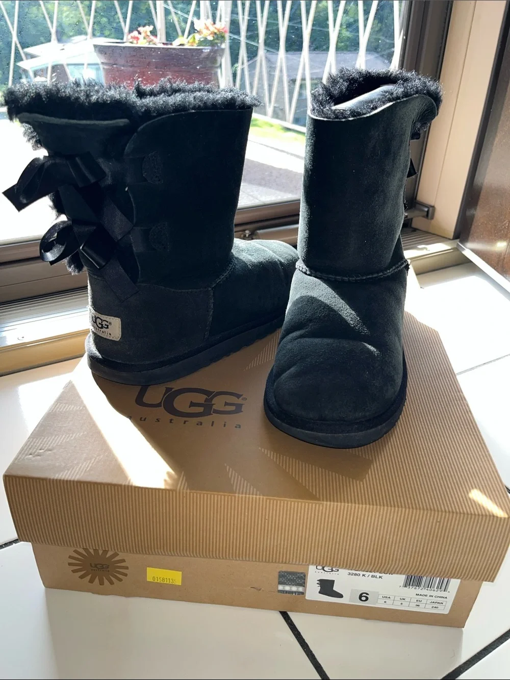 UGG Black Suede Mid-Calf Bow Boots